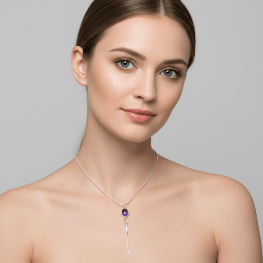Model wearing amethyst tassel necklace