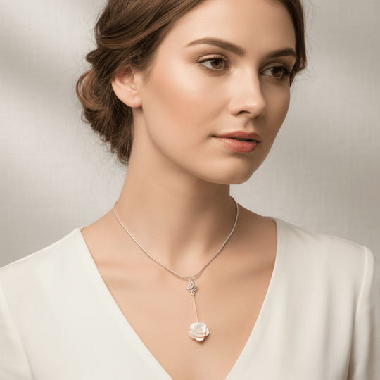 Model wearing carved shell rose necklace