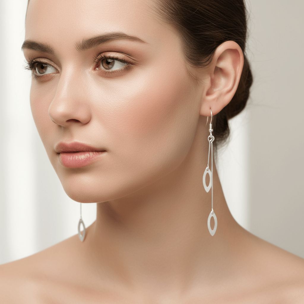 Model wearing sterling silver drop earrings