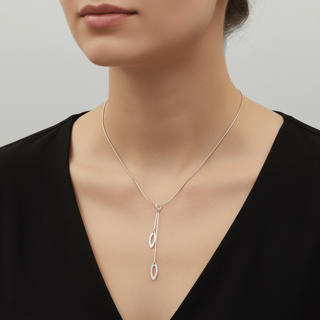 Model wearing sterling silver leaf Y-necklace