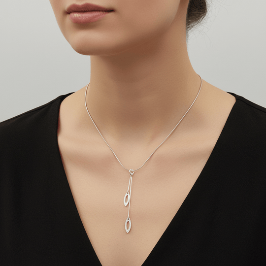 Model wearing sterling silver leaf Y-necklace