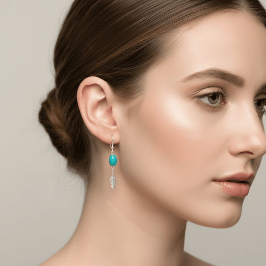 Model wearing Sterling Silver Turquoise and Feather Earrings - Correct Scale