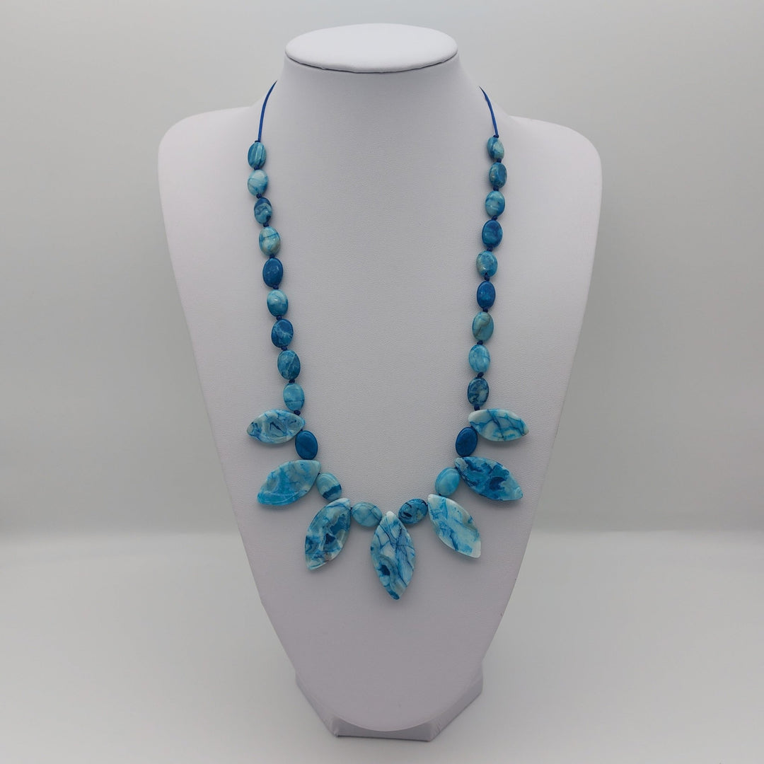 Blue Crazy Lace Agate statement necklace showing graduating marquise gemstone design