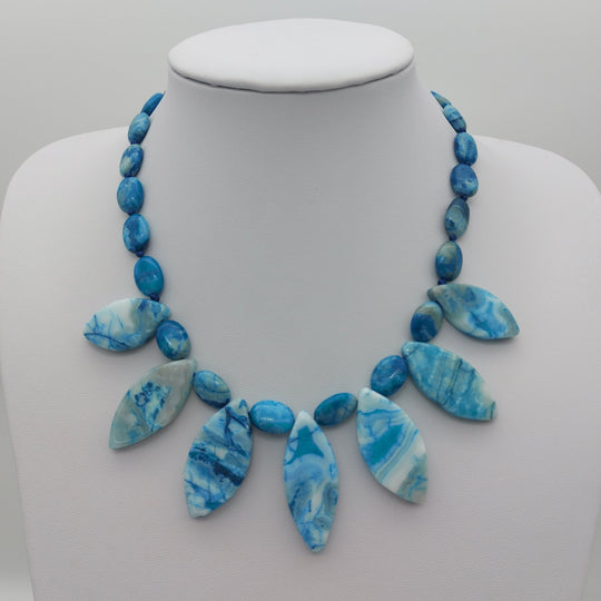 Blue Crazy Lace Agate statement necklace B showing its individual gemstone colours and patterns