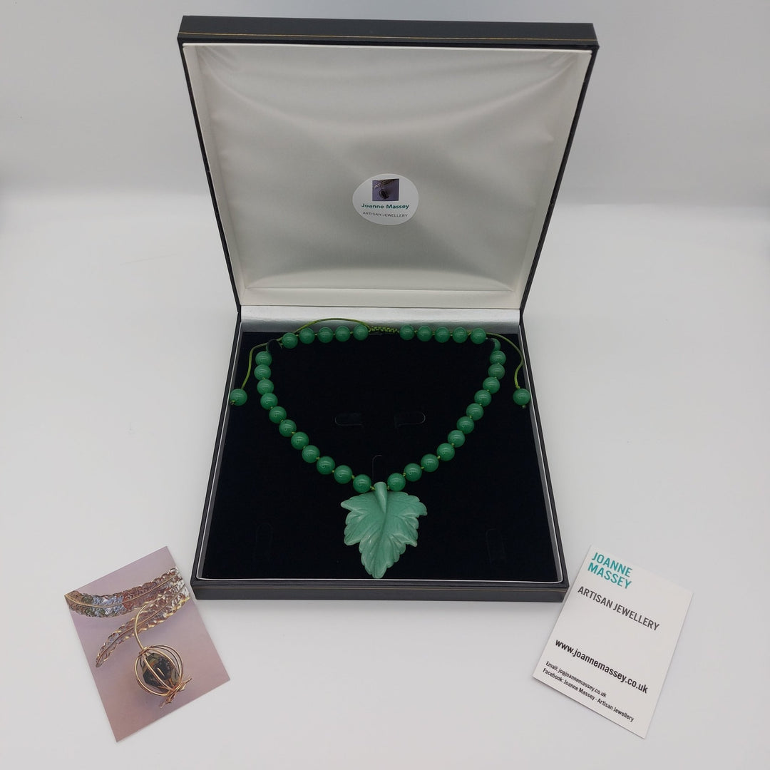 Handmade green aventurine carved leaf necklace presented in jewellery gift box