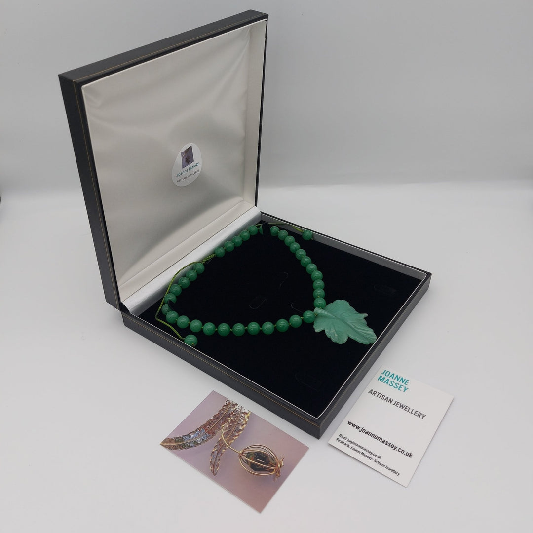 Green Aventurine carved leaf necklace presented gift-ready in jewellery box with business cards 