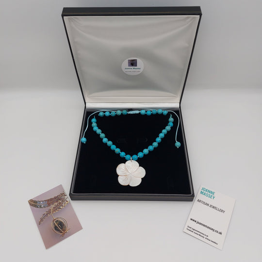Blue Magnesite &amp; Mother of Pearl Carved Flower Necklace | Hand-Knotted | December Birthstone